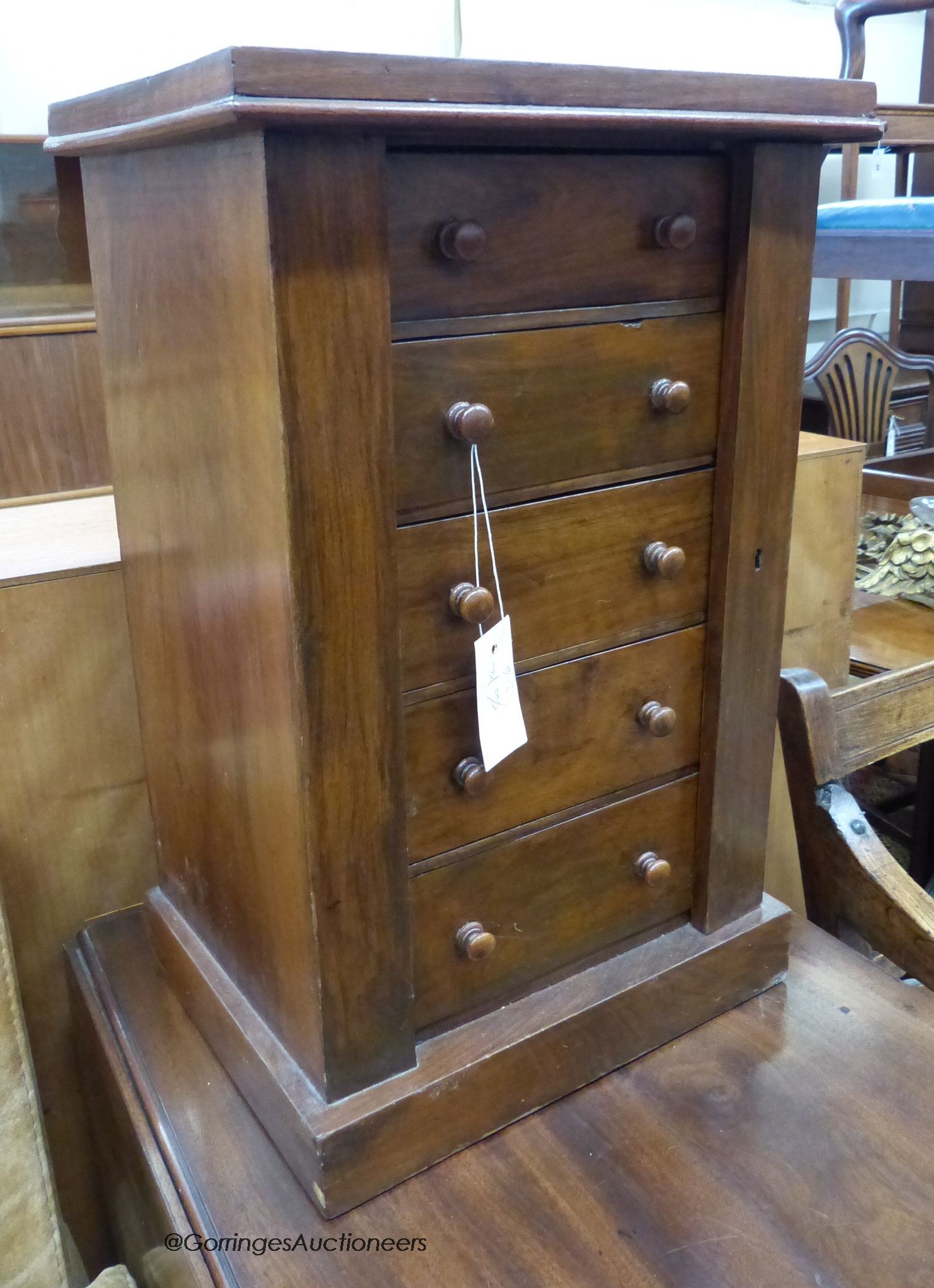 A late Victorian miniature walnut Wellington chest, width 34cm, depth 26cm, height 54cm